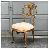 PAIR GILT CHAIRS | Fancy accent chairs, including an armchair (37 x 25 x 26 in.) and a side chair, e