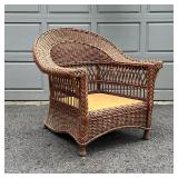 PALECEK WICKER ARM CHAIR | Appears in excellent condition, no cushion; h. 37 x 37 x 37 in.