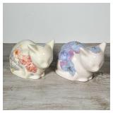 Including a paper mache weighted cat, an Italian faience cat, and a pair of floral decorated ceramic