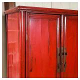 CHINESE LACQUERED CABINET | Red lacquered cabinet, with double doors opening to reveal two drawers b