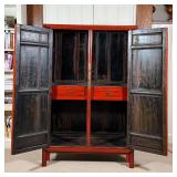 CHINESE LACQUERED CABINET | Red lacquered cabinet, with double doors opening to reveal two drawers b