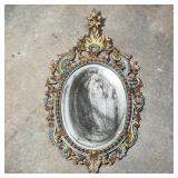 ANTIQUE PAINTED MIRROR  | Carved, gilt, and polychrome framed oval wall mirror with Rococo decoratio