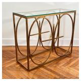 MODERN GLASS TOP CONSOLE TABLE | Contemporary hall table having a glass top on an openwork gilt meta