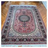 HAND-WOVEN AREA CARPET | Handmade Pakistani rug with central medallion on an oval ground within flor