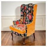 NEEDLEPOINT WING CHAIR | With rose patterned needlepoint upholstery, separate seat cushion; h. 46 x 