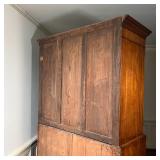  of two-piece construction, on bracket feet; overall h. 83 x w. 52 x d. 23 in.