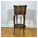 ANTIQUE SIDE TABLE | With 3/4 gallery top and tambour door with a kidney-shaped lower shelf; h. 27 x
