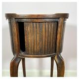 ANTIQUE SIDE TABLE | With 3/4 gallery top and tambour door with a kidney-shaped lower shelf; h. 27 x