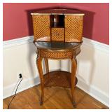 INLAID BAR CABINET | Inlaid wood with ormolu mounts, having a demilune superstructure with two cabin