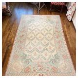 FRENCH MONKEY RUG | Flat-woven needlepoint rug having an overall field with monkeys within a border 