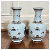 PAIR CHINESE ARMORIAL VASES | With blue underglaze and gilt highlights; h. 13 x dia. 7 in.