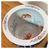 with key motif border, the interiors painted with goldfish, on small wood stands; h. 9 x dia. 10-1/4