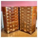 with five drawers over double cabinet doors and decorative pressed brass hardware, each having a dra