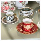 Aynsley, Wedgwood, and Limoges; plus a teapot and matching coffee pot with transferware floral decor