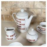 service for six, including six cups and saucers, an open creamer, covered sugar, and a coffee pot (h