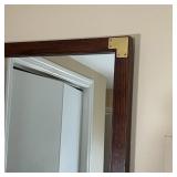 CAMPAIGN STYLE WALL MIRROR | Rectangular wall mirror with brass corner accents - 42-1/4 x 22-1/4 in.