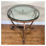  round glass top on a shaped bronze tone metal frame; h. 25-1/2 x dia. 29 in. [appearing in overall 