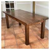  DARK WOOD DINING TABLE | No apparent brand mark, with board style top on square block legs, with a 