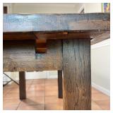 board style top on square block legs, with a single drawer, with two extension leaves that attach to