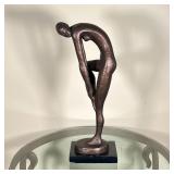 MODERNIST SCULPTURE | Bronze style composition sculpture of a female figure, signed on the bottom "R