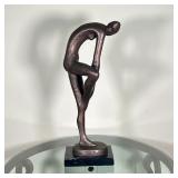 sculpture of a female figure, signed on the bottom "RUSTIN PROD INC 1980" - h. 22-1/2 x w. 9 in. 