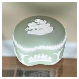 WEDGWOOD JADE GREEN BOX | Showing a rider with chariot, shaped lidded box, stamped on the bottom; h.