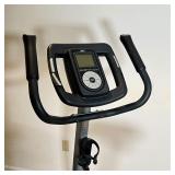 REEBOK STATIONARY BICYCLE | In home exercise stationary bike, Reebok model RT 300 - h. 56 in.