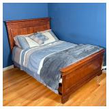 WOOD BEDFRAME | Full size bed frame of nicely figured dark wood, with low footboard, likely by Young