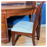 attached hutch having a bulletin board background with open shelves and cubbies overhead; h. 77 in. 