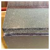 Kimball International display stand/pedestal or side table, having a black marble top on a black pai