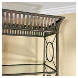 GLASS ETAGERE | Tall display shelf, having four open glass shelves on a faux patinated metal frame; 