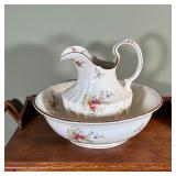 (3pc) WASHSTAND SET | Comprising an antique Cauldon stoneware wash bowl and water pitcher resting at