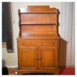 WOODEN PLATE CABINET | Small wooden cupboard with two open shelves over a lower section with a full 