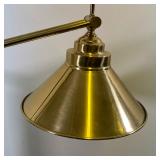 BRASS FLOOR LAMP | Floor / reading lamp, with an articulating arm on a reeded column base (dia. 11 i