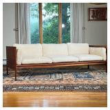 DANISH MID-CENTURY SOFA | Teak and teak veneer couch of Danish mid-century modern design, with wool 