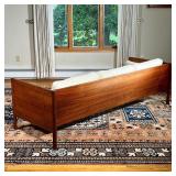 DANISH MID-CENTURY SOFA | Teak and teak veneer couch of Danish mid-century modern design, with wool 