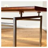 mid-century modern coffee table in the manner of Gio ponti, with a single piece wood top "floating" 