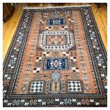 HAND-KNOTTED PERSIAN ARDABIL CARPET | Geometric overall pattern with a rust colored field, hand knot