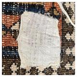 Geometric overall pattern with a rust colored field, hand knotted and of very high quality - 12 ft. 