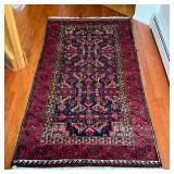 RED AREA CARPET | Long area carpet or a runner for a small corridor, with overall red pattern on a d