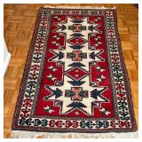 GEOMETRIC AREA RUG | Three medallions on a red ground - 6 ft. 2 in. x 3 ft. 6 in.