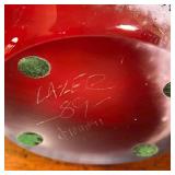 Signed "LAZER" and dated 89 on the bottom, with lilac and gilt exterior and cranberry interior - h. 