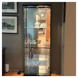 With mirrored back and glass side and front panel, with glass door opening on the right side, illumi