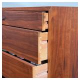 MID-CENTURY DRESSER | Mid-century modern chest of drawers, having a small drawer over three full wid