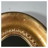 GILT OVAL WALL MIRROR | Gilt frame wall mirror of oblong oval shape - 19-1/4 x 10-1/2 in.