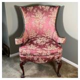 ANTIQUE LEATHER TACK ARMCHAIR | Of psuedo-wingback form, the back and armrests with green leather an