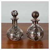 (2pc) SILVER OVERLAY PERFUME BOTTLES | Two similar perfume bottles with silver overlay, one with ind