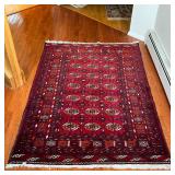 BOKHARA AREA RUG | With overall field on a red ground - 5 ft. 10 in. x 4 ft. 1 in.