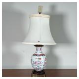 CHINESE FAMILLE ROSE VASE | Mounted as a table lamp, fixed to a carved wood stand on a brass openwor