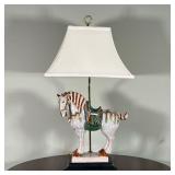 TANG-STYLE HORSE LAMP | A single bulb lamp with a Chinese Tang-style horse as the base - h. 29 x w. 